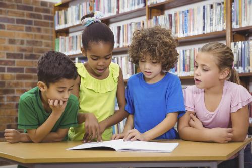 Group of kids reading