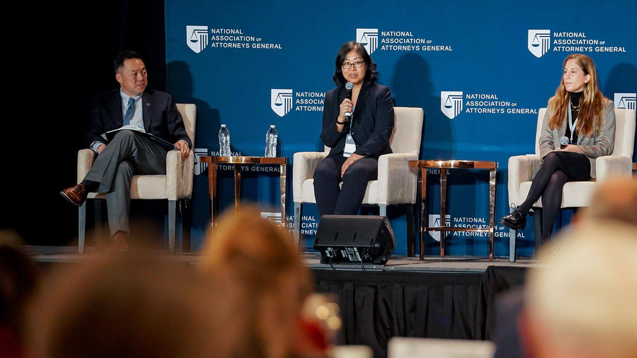 Linda Charmaraman, Ph.D., and colleagues at the National Association of Attorneys General conference in December 2022.