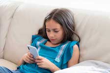 Young Girl Using Smartphone