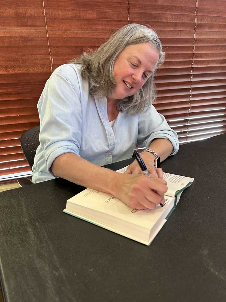 Kate Price signing book