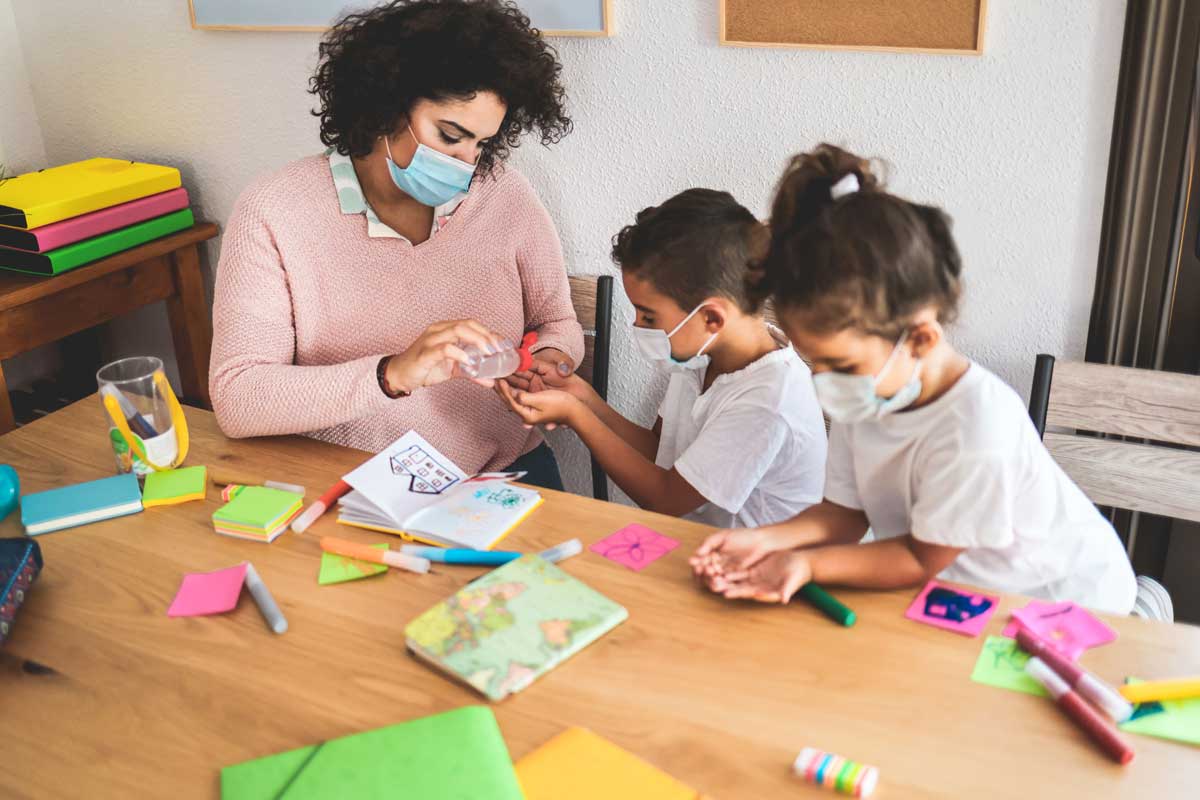 child care provider with children during covid-19